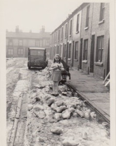 photo of little girl in a Toxteth street illustrating a page about writer, Grace Jolliffe